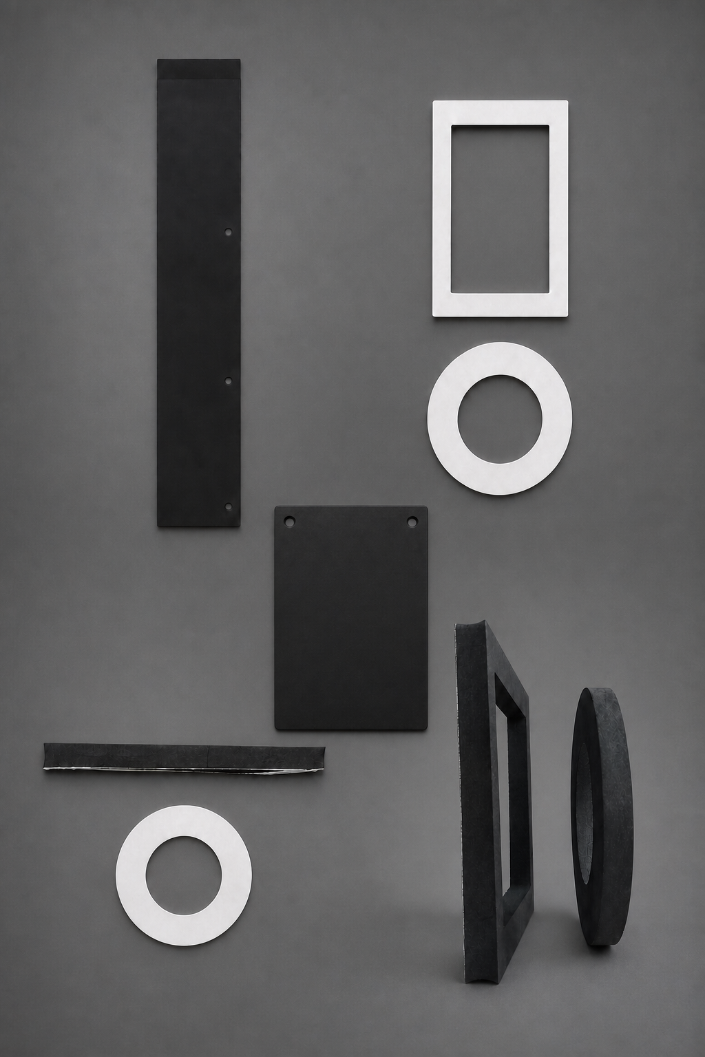 Composite product view of SKAMS rubber skirts and rectangular and circular gaskets, including a two-hole rectangular skirt